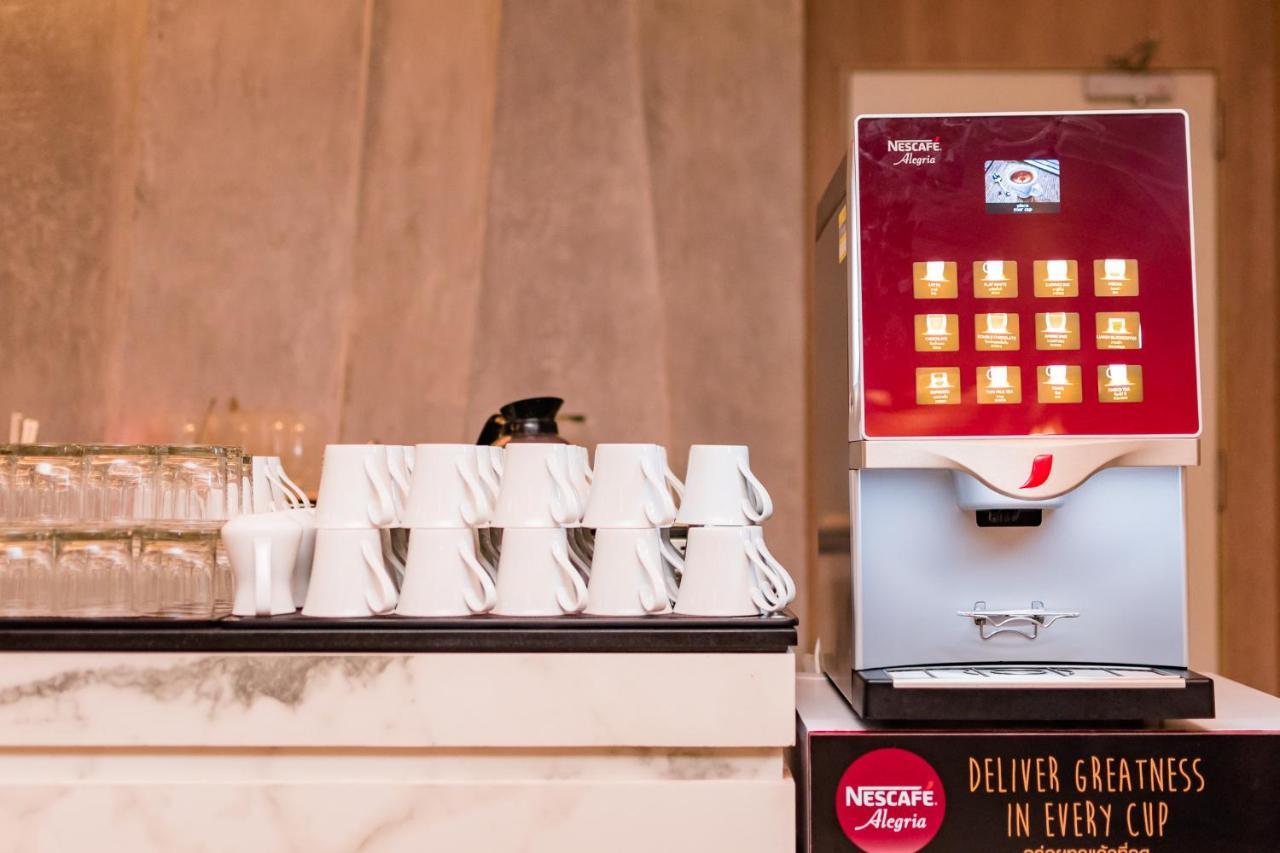 Oceanfront Beach Resort - Sha Extra Plus Patong Eksteriør billede A Nespresso Professional machine