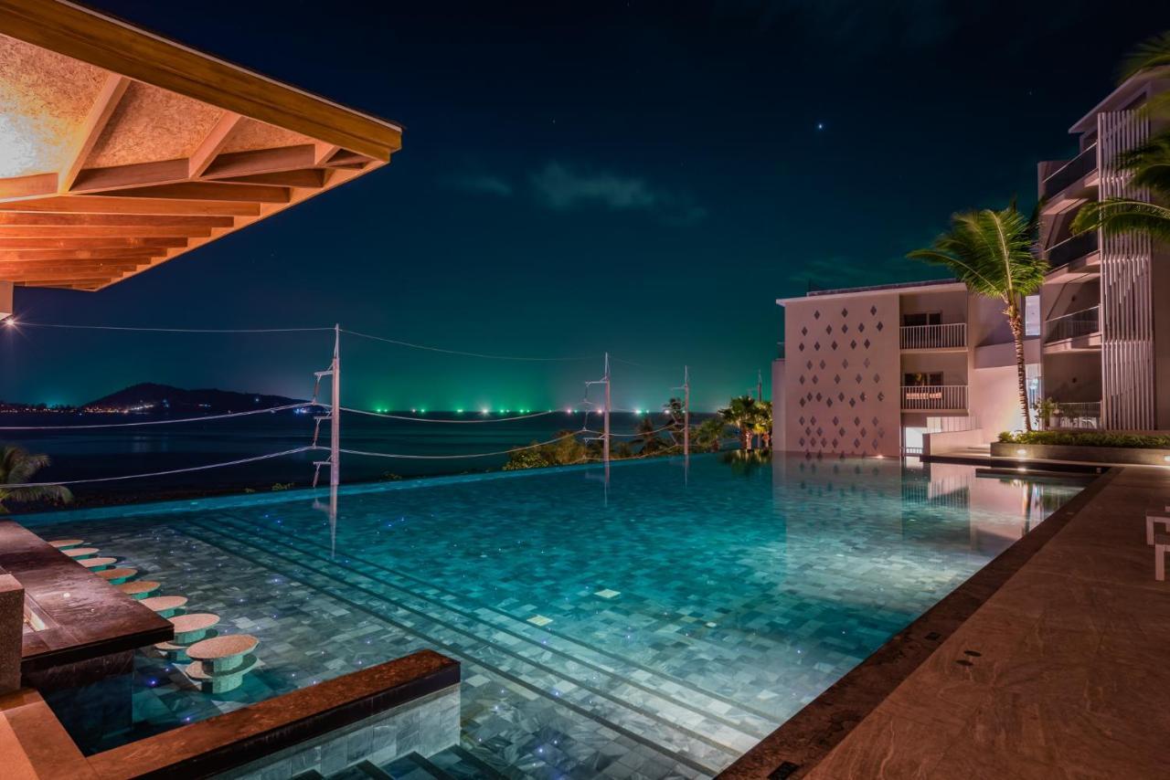 Oceanfront Beach Resort - Sha Extra Plus Patong Eksteriør billede Infinity pool at the resort