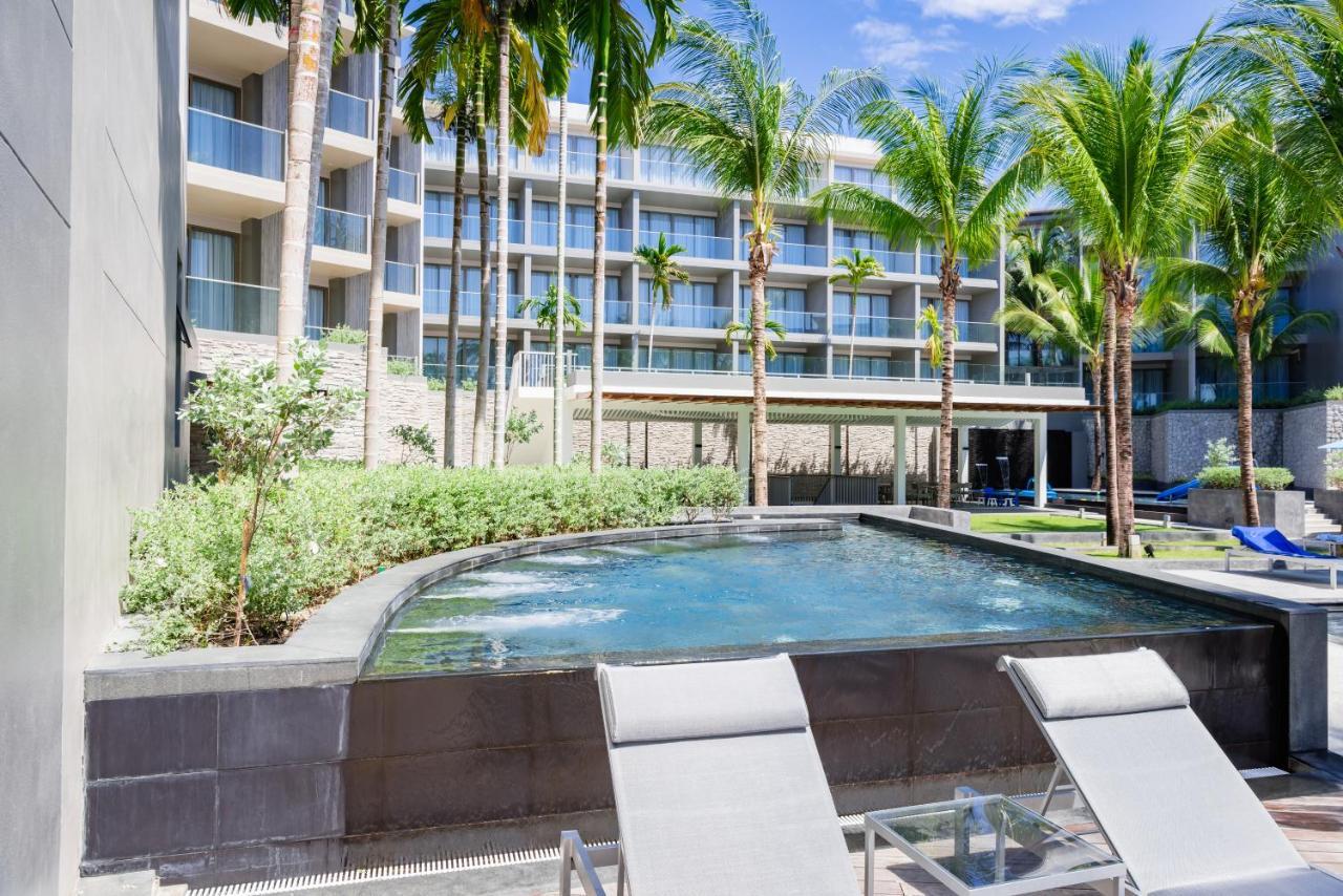 Oceanfront Beach Resort - Sha Extra Plus Patong Eksteriør billede The pool at the Hilton